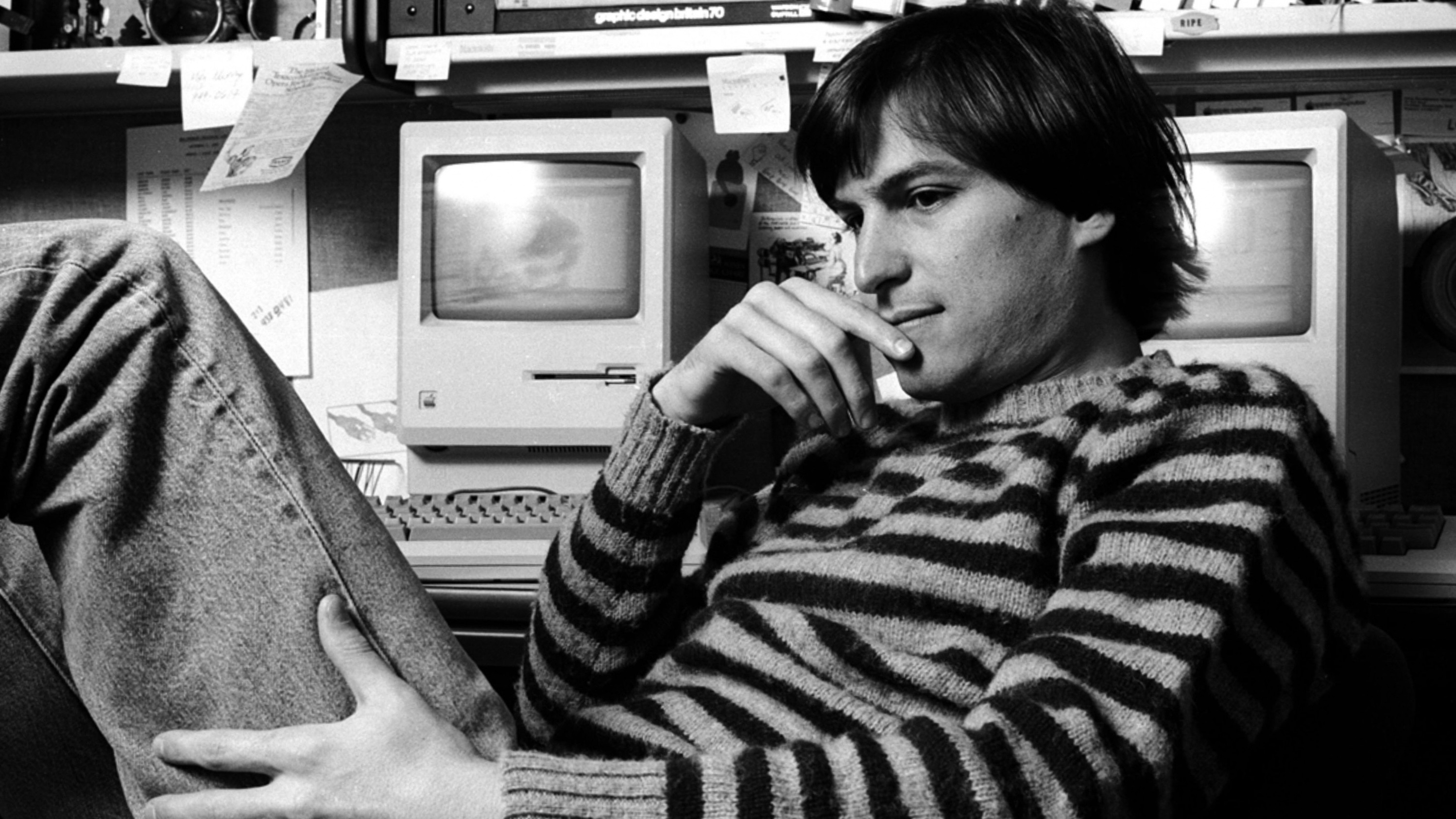 Steve Jobs in 1984 with the original Macintosh, ten years after his calligraphy class.